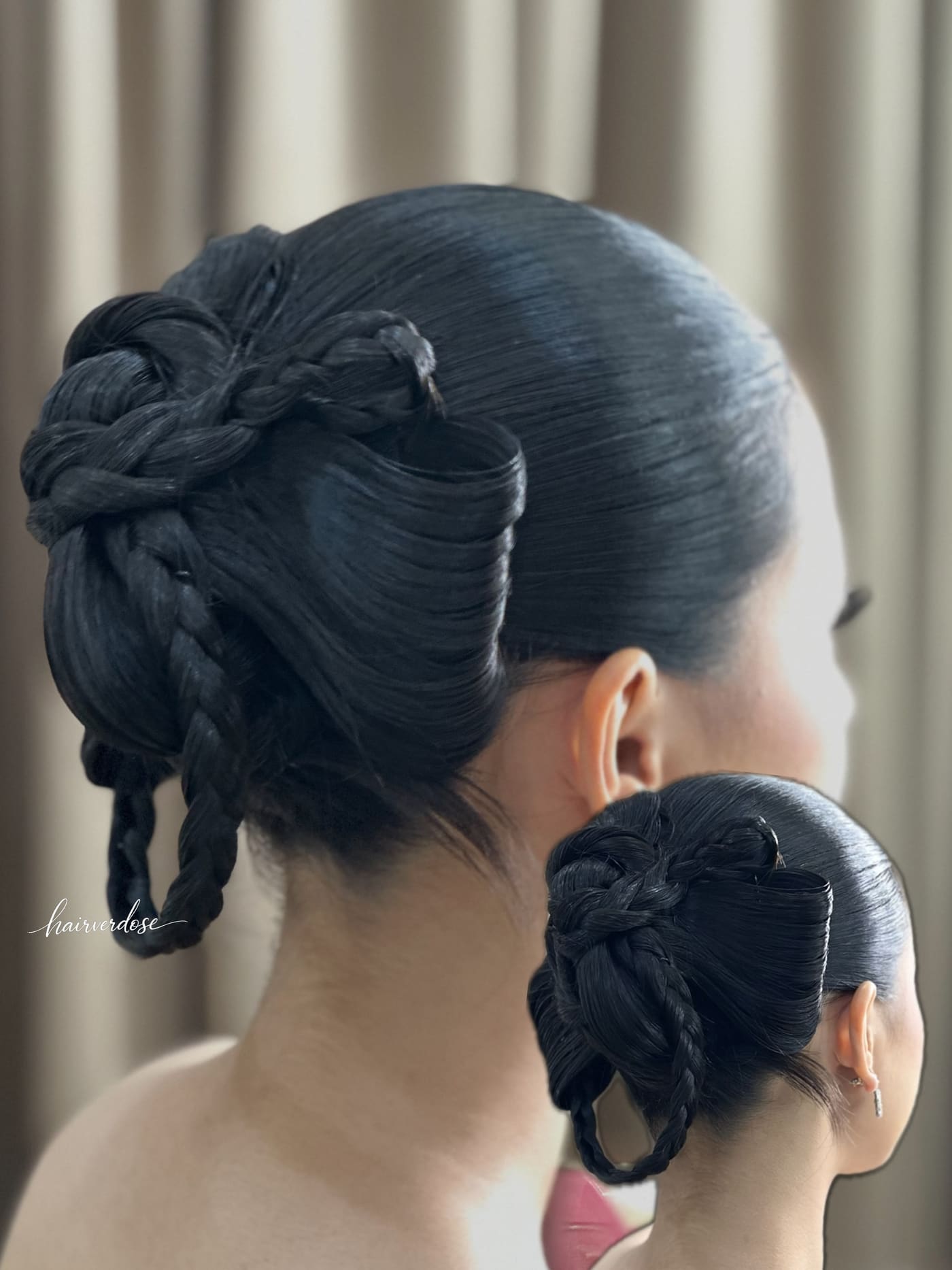 Braided updo with a sculpted twist, seen from behind